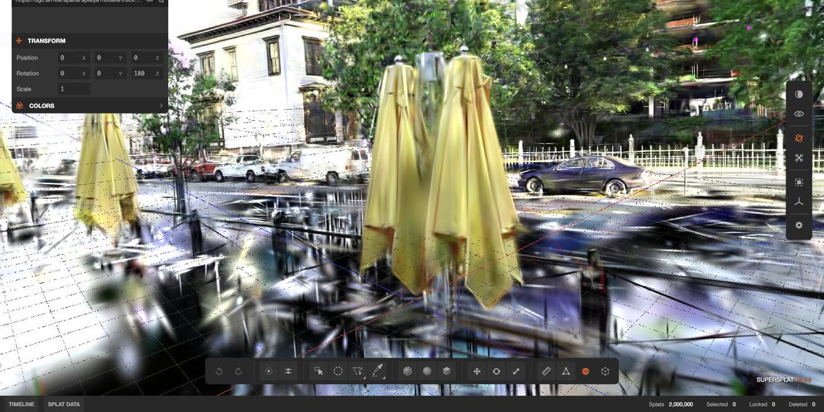The SuperSplat 3.3.0 editor with a Gaussian splat capture of a street cafe loaded — furled yellow umbrellas over metal tables, parked cars and a tree-lined street behind. The scene manager and transform panels sit at the left, the tool strip along the bottom, and the status bar reads two million splats
